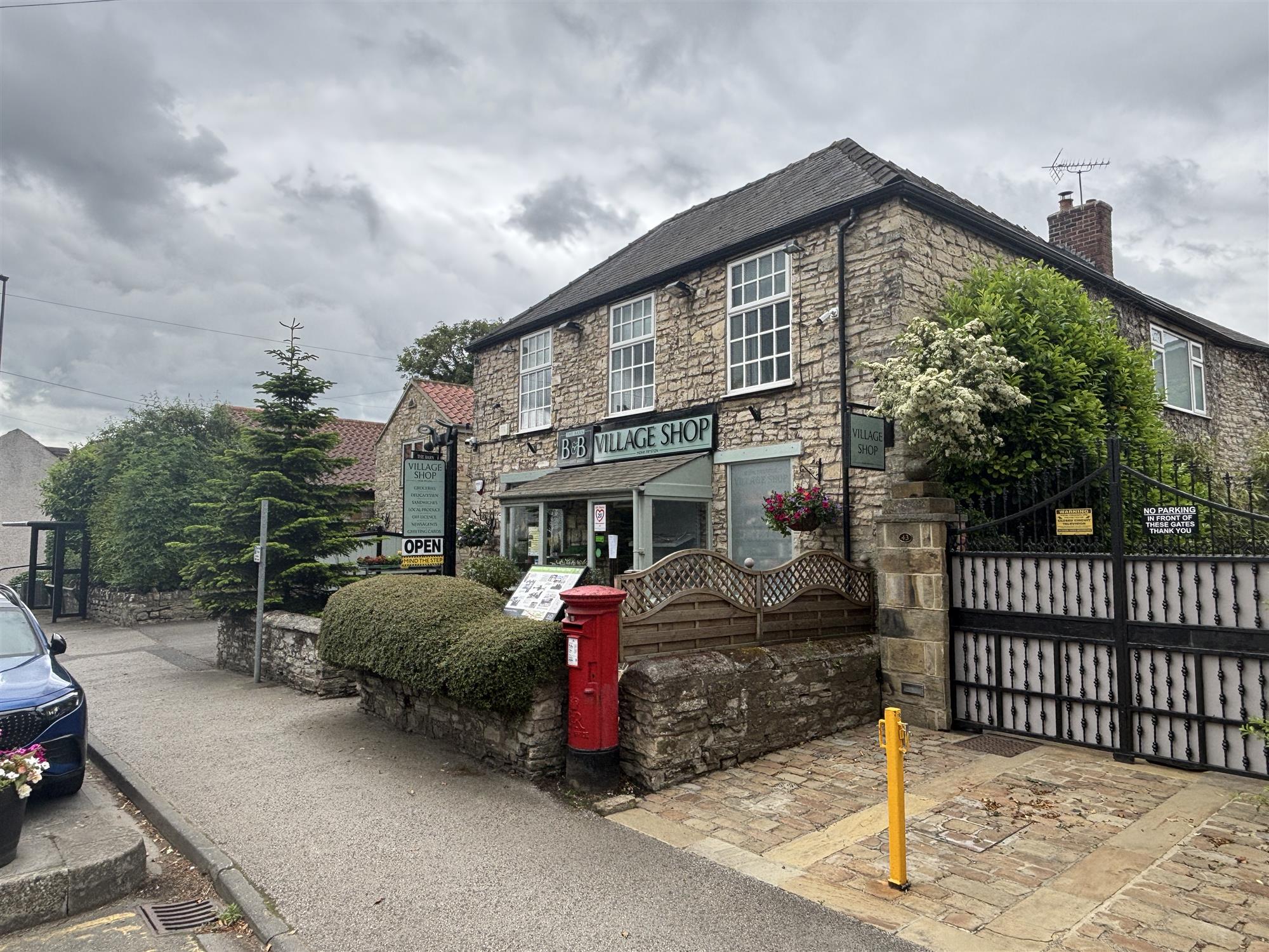 VILLAGE STORES AND CONVENIENCE WITH FOUR BEDROOM FAMILY ACCOMMODATION AND FOUR LETTING BEDROOMS