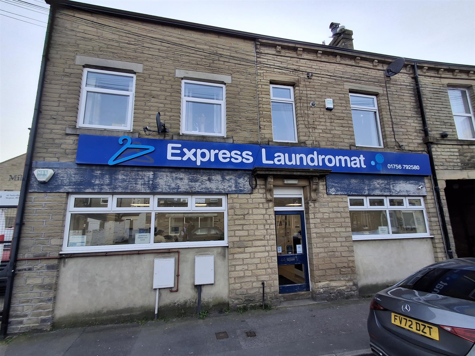 FREEHOLD LAUNDRETTE AND TWO FLATS